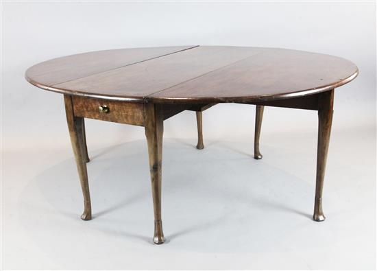 A George II red walnut drop leaf dining table, W.5ft H.2ft 5in.